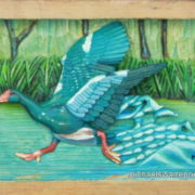 27-water-off-a-duck-24cm-x-17cm-x-3-5cm-relief-sculpture-jelutong-wood-artists-oils-michael-swanepoel-800x552